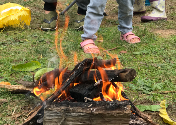 Burning timber, happy family
